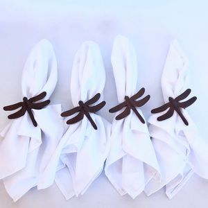 White reusable napkins with firefly holders